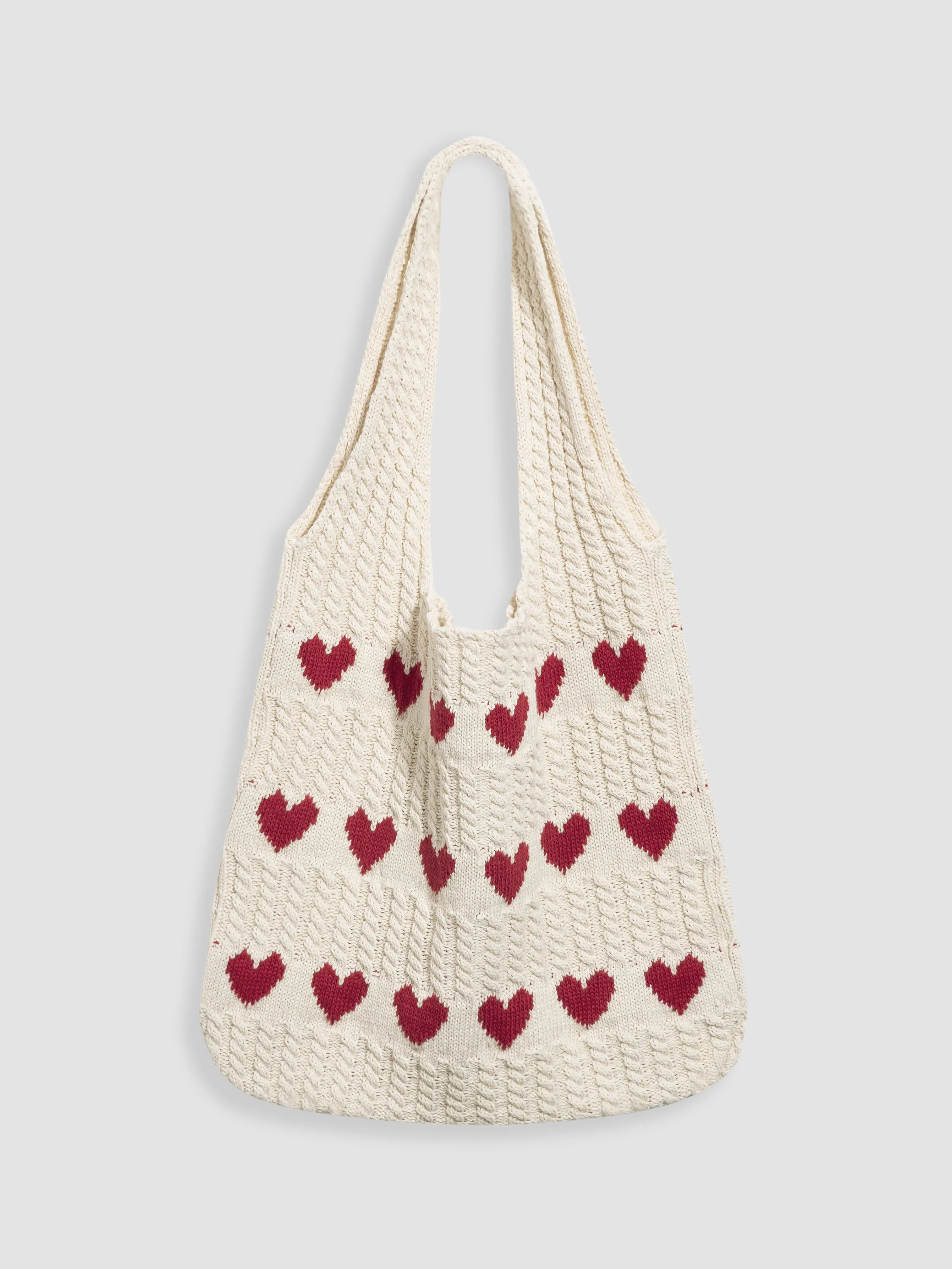 Bolso tote trenzado con patrón de corazón